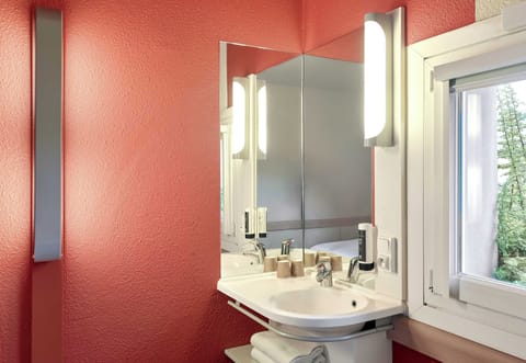 Shower, eco-friendly toiletries, hair dryer, towels