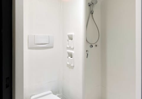 Shower, eco-friendly toiletries, hair dryer, towels