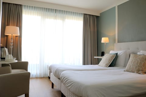 Comfort Double Room, Courtyard View | In-room safe, desk, cribs/infant beds, free WiFi