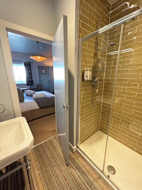 Comfort Double or Twin Room | Bathroom | Shower, designer toiletries, hair dryer, towels
