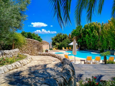 Seasonal outdoor pool, pool umbrellas, sun loungers