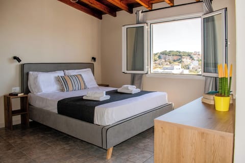 Superior Apartment, 1 Bedroom, Kitchenette, Sea View | Premium bedding, in-room safe, blackout drapes, soundproofing