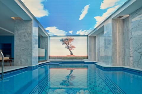 Indoor pool, seasonal outdoor pool, pool umbrellas, sun loungers