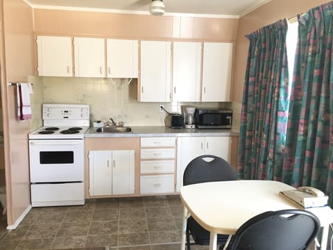 Economy Double Room, 2 Queen Beds, Kitchenette | Private kitchen | Coffee/tea maker, fridge, microwave (on request)