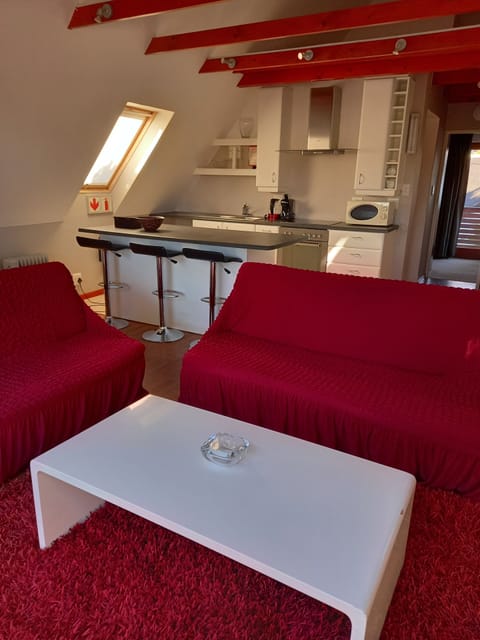 Loft Apartment, King Bed or Twin Beds, Lounge,2 Sofas, Kitchen, Balcony, View | Living room | 0-inch flat-screen TV with cable channels, TV