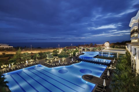 Indoor pool, seasonal outdoor pool, pool umbrellas, sun loungers