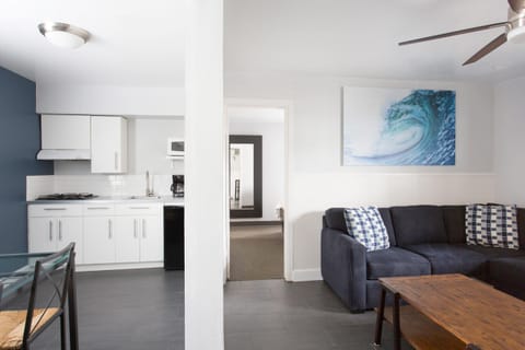 Large 1 Bedroom Queen Suite with Kitchen | Living area | TV