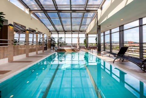 Indoor pool, open 7:00 AM to 10:00 PM, sun loungers
