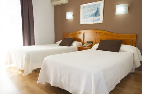 Desk, blackout drapes, free WiFi, bed sheets