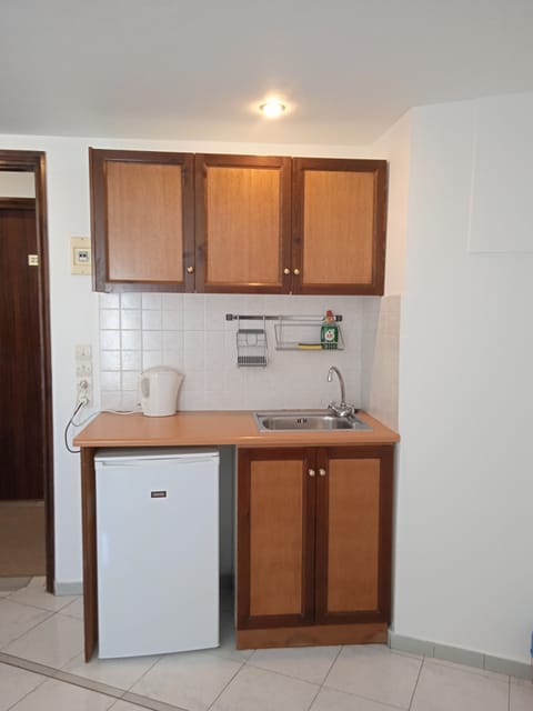 Quadruple Room, Sea View | Private kitchenette | Fridge