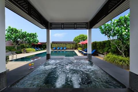 Outdoor pool, pool umbrellas, sun loungers