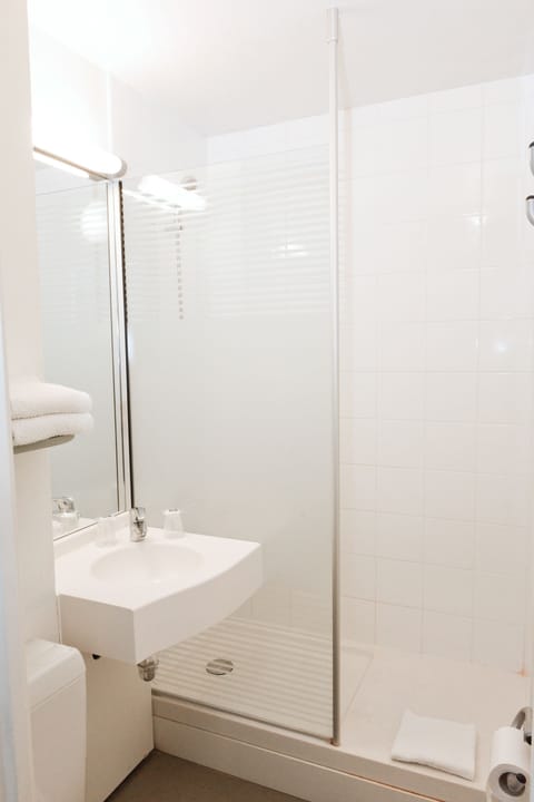 Shower, eco-friendly toiletries, hair dryer, towels