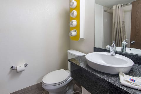 Combined shower/tub, towels, soap, shampoo