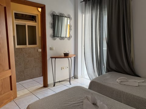 Twin Room, Private Bathroom | Free WiFi, bed sheets