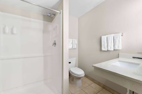 Double Room, 2 Double Beds | Bathroom | Combined shower/tub, free toiletries, hair dryer, towels