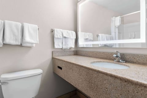 Standard Room, 2 Queen Beds | Bathroom | Combined shower/tub, free toiletries, hair dryer, towels