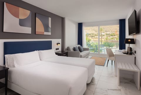 Premium bedding, memory foam beds, minibar, in-room safe