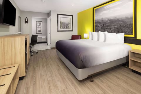 Room, 1 King Bed, Accessible, Non Smoking (Mobility, Bathtub W/grab Bars) | Iron/ironing board, free WiFi, bed sheets