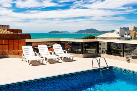 2 outdoor pools, open 10:00 AM to 10:00 PM, sun loungers