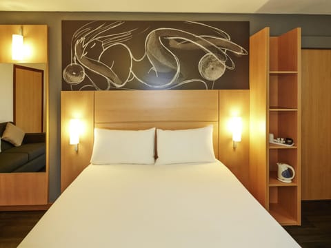 Hypo-allergenic bedding, desk, blackout drapes, soundproofing