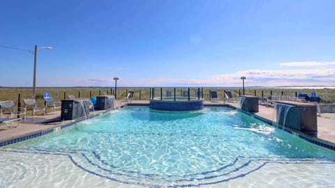 Outdoor pool, open 9 AM to 10 PM, sun loungers