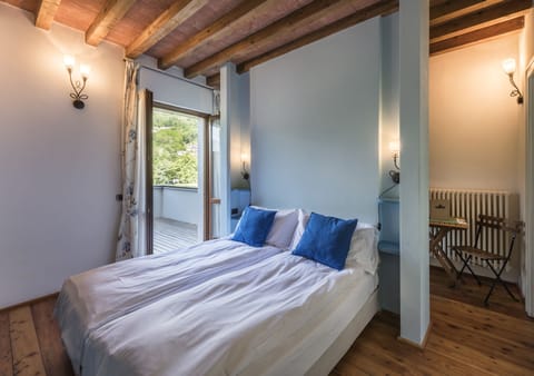 Family Room, Terrace | Minibar, desk, free WiFi, bed sheets