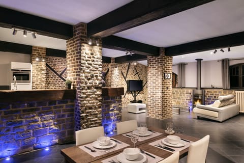 Deluxe Penthouse, 2 Bedrooms, Terrace | Living area | 50-inch flat-screen TV with cable channels, plasma TV