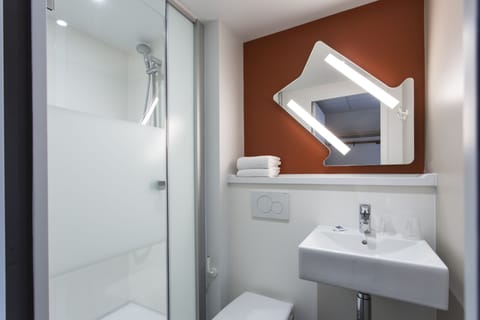 Shower, eco-friendly toiletries, hair dryer, towels