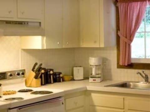 Remember Baker room | Individually decorated, desk, blackout drapes, iron/ironing board