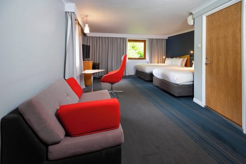 Standard Room, Multiple Beds (with Free Hot Breakfast) | Desk, laptop workspace, iron/ironing board, free WiFi