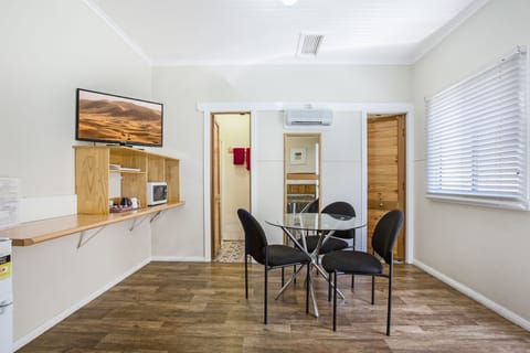 Economy Twin or Triple Room | Minibar, iron/ironing board (on request), WiFi (free), bed sheets