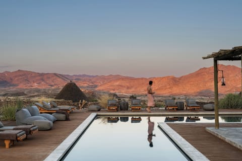 Outdoor pool, pool umbrellas, sun loungers
