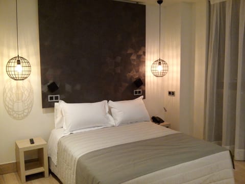 Desk, blackout drapes, soundproofing, iron/ironing board