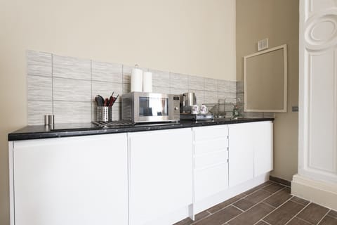 Junior Suite, 1 Double Bed, Non Smoking | Private kitchen | Electric kettle