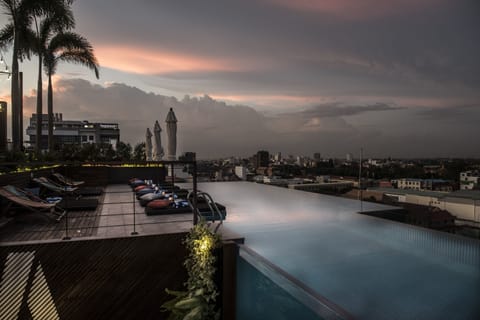 Outdoor pool, pool umbrellas, sun loungers