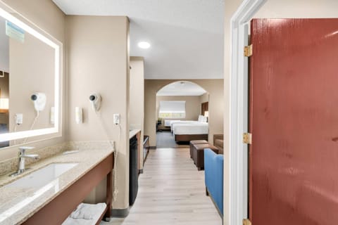 Suite, 2 Queen Beds with Sofa Bed, Non smoking | Desk, laptop workspace, blackout drapes, iron/ironing board
