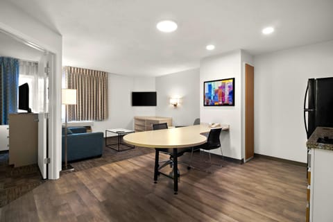 Desk, laptop workspace, blackout drapes, iron/ironing board