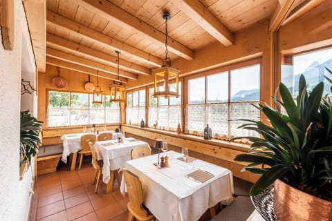 Breakfast, lunch, dinner served; local cuisine 