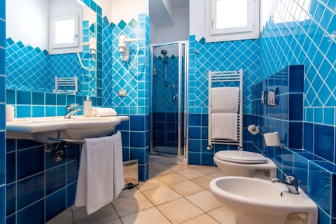 Shower, rainfall showerhead, eco-friendly toiletries, hair dryer