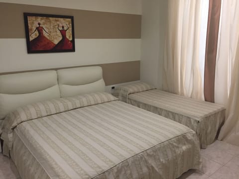 Standard Triple Room | Down comforters, minibar, in-room safe, desk
