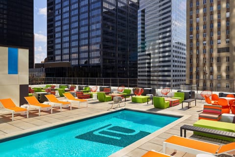 Outdoor pool, open 7:00 AM to 11:00 PM, sun loungers