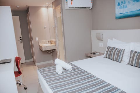 Standard Double Room | Minibar, desk, laptop workspace, blackout drapes