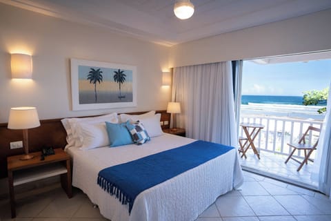 Deluxe Room, Sea View | Minibar, in-room safe, blackout drapes, WiFi