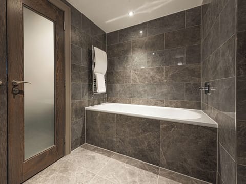 Signature Suite | Bathroom | Shower, rainfall showerhead, designer toiletries, hair dryer