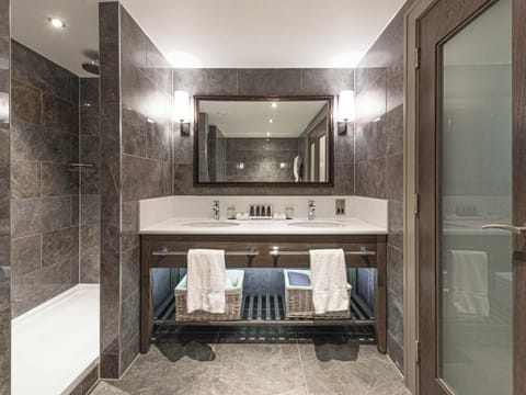Signature Suite | Bathroom | Shower, rainfall showerhead, designer toiletries, hair dryer