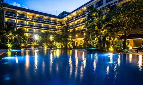 Outdoor pool, open 6:00 AM to 9:00 PM, pool umbrellas