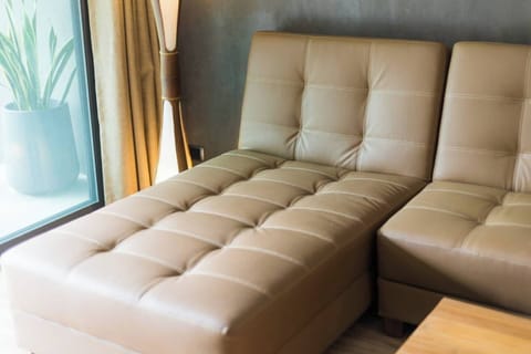 Deluxe Double room | Living area | Flat-screen TV