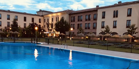 Indoor pool, outdoor pool, pool umbrellas, sun loungers