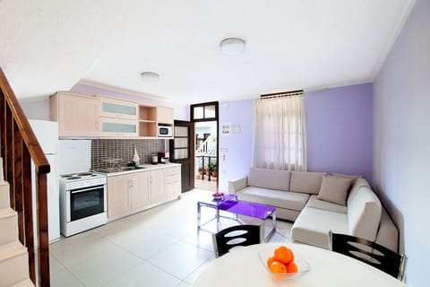 Family Apartment, 2 Bedrooms, Balcony | Living area | 26-inch flat-screen TV with satellite channels, TV