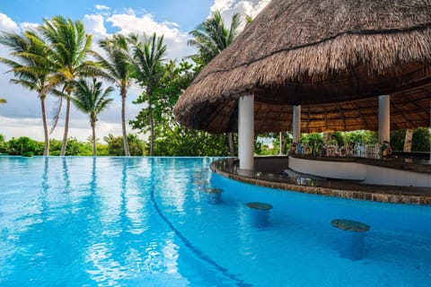 9 bars/lounges, 5 swim-up bars, beach bar